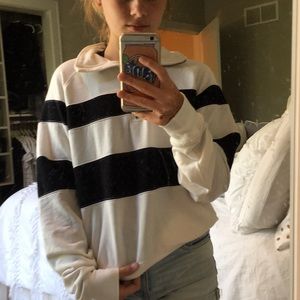 white and blue striped quarter-zipped sweatshirt